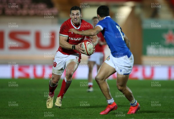 051220 - Wales v Italy - Autumn Nations Cup 2020 - George North of Wales is challenged by Paolo Garbisi of Italy