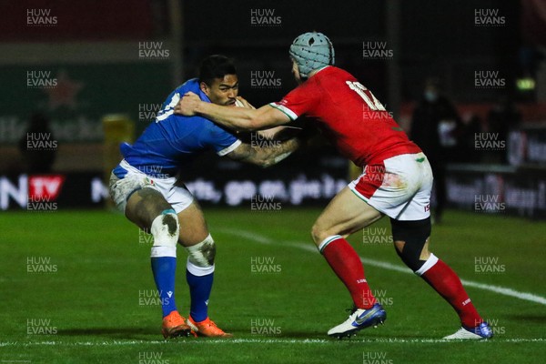 051220 - Wales v Italy, Autumn Nations Cup 2020 - Montanna Ioane of Italy is held by Johnny Williams of Wales Johnny Williams of Wales