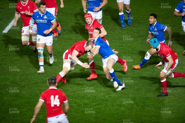 051220 - Wales v Italy - Autumn Nations Cup 2020 - Paolo Garbisi of Italy is tackled by Alun Wyn Jones of Wales 
