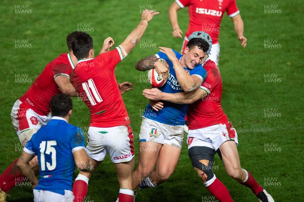 051220 - Wales v Italy - Autumn Nations Cup 2020 - Marco Zanon of Italy is tackled by Jonathan Davies of Wales 