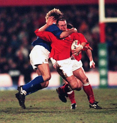 070298 - Wales v Italy - Italy Tour -  Alan Bateman of Wales is tackled by Julian Gardner