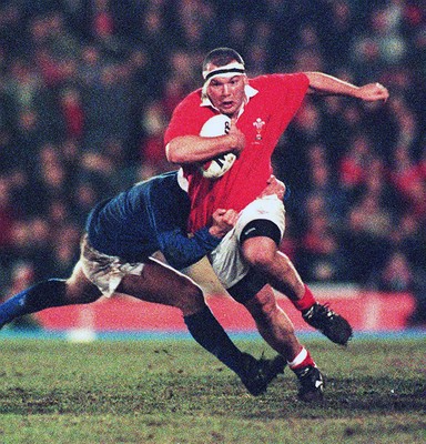 070298 - Wales v Italy - Italy Tour -  Andrew Lewis of Wales is tackled by Andrea Sgorlon