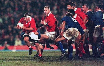 070298 - Wales v Italy - Italy Tour -  Andrew Lewis of Wales is tackled by Andrea Sgorlon