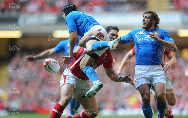 100312 - Wales v Italy - RBS Six Nations 2012 -Kristopher Burton of Italy is tackled by George North of Wales