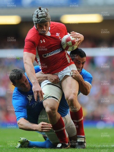 100312 - Wales v Italy - RBS Six Nations 2012 -Jonathan Davies of Wales is stopped