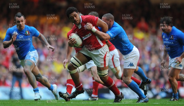 100312 - Wales v Italy - RBS Six Nations 2012 -Toby Faletau of Wales is tackled by Fabio Semenzato of Italy