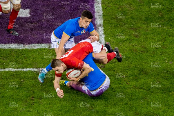 110318 - Wales v Italy, Nat West 6 Nations Championship - Liam Williams of Wales  goes to ground with the ball 