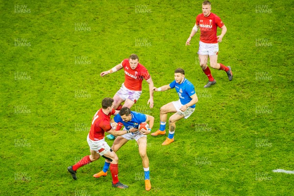 110318 - Wales v Italy, Nat West 6 Nations Championship - Steff Evans of Wales tries to stop the Italian defence 