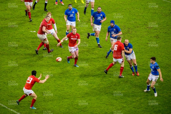110318 - Wales v Italy, Nat West 6 Nations Championship - Hadleigh Parkes of Wales passes to Leigh Halfpenny of Wales 