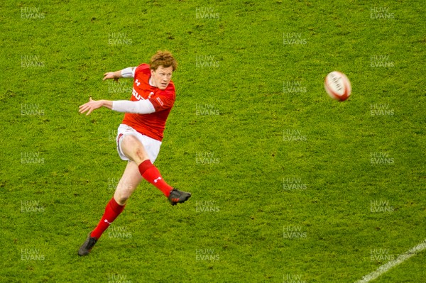 110318 - Wales v Italy, Nat West 6 Nations Championship - Rhys Patchell of Wales kicks the ball forward 