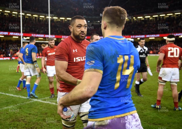 110318 - Wales v Italy - NatWest 6 Nations 2018 - Taulupe Faletau of Wales and Tommaso Benvenuti of Italy at the end of the game