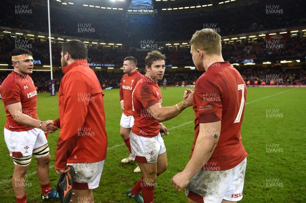 110318 - Wales v Italy - NatWest 6 Nations 2018 - Leigh Halfpenny and James Davies of Wales at the end of the game