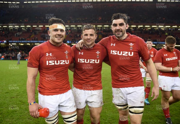 110318 - Wales v Italy - NatWest 6 Nations 2018 - Ellis Jenkins, Elliot Dee and Cory Hill of Wales at the end of the game