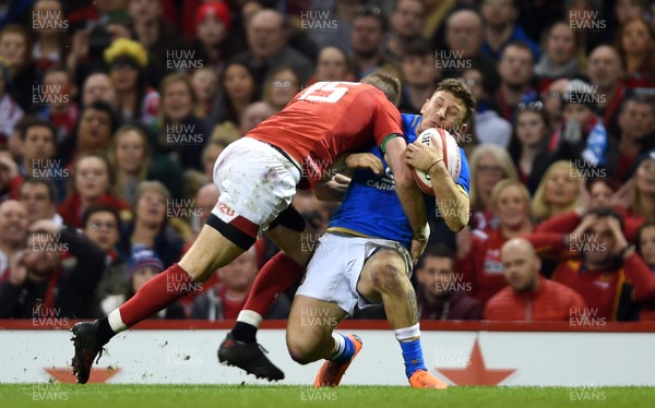 110318 - Wales v Italy - NatWest 6 Nations 2018 - Liam Williams of Wales tackles Matteo Minozzi of Italy Liam Williams of Wales is shown a yellow card for the tackle