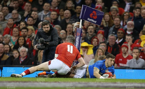 110318 - Wales v Italy - Natwest 6 Nations Championship - Matteo Minozzi of Italy dives over the line to score a try
