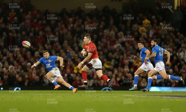 110318 - Wales v Italy - Natwest 6 Nations Championship - Liam Williams of Wales sends the ball wide