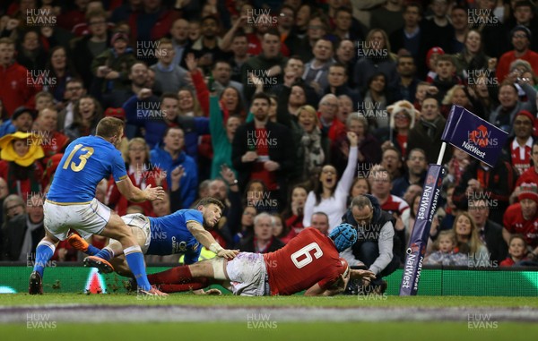 110318 - Wales v Italy - Natwest 6 Nations Championship - Justin Tipuric of Wales dives over to score a try