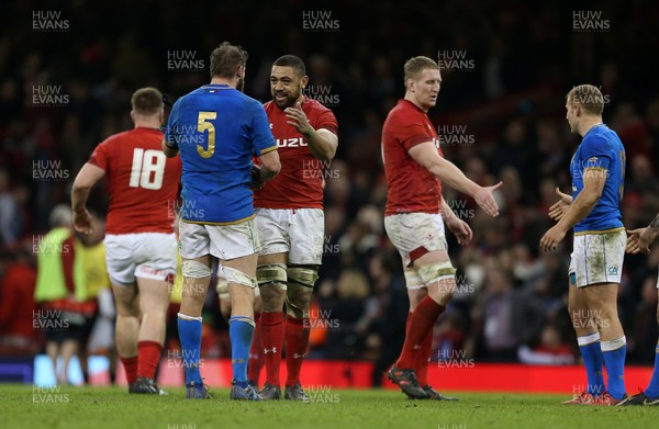 110318 - Wales v Italy - Natwest 6 Nations Championship - Taulupe Faletau of Wales shakes hands with Dean Budd of Italy