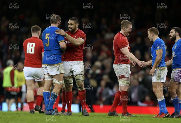 110318 - Wales v Italy - Natwest 6 Nations Championship - Taulupe Faletau of Wales shakes hands with Dean Budd of Italy
