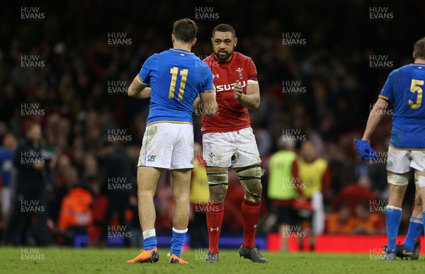110318 - Wales v Italy - Natwest 6 Nations Championship - Taulupe Faletau of Wales shakes hands with Mattia Bellini of Italy