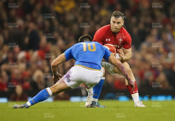 110318 - Wales v Italy, NatWest 6 Nations 2018 - Gareth Davies of Wales drives into Tommaso Allan of Italy