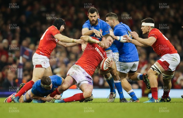 110318 - Wales v Italy, NatWest 6 Nations 2018 - Hadleigh Parkes of Wales looks to keep possession as he is tackled