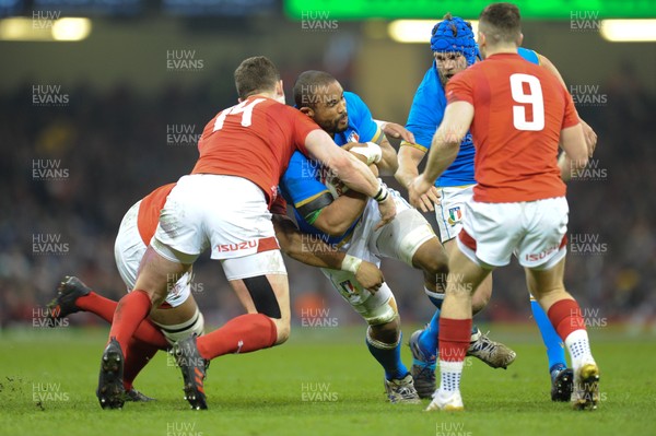 110318 - Wales v Italy - NatWest 6 Nations Championship - Maxime Mbanda of Italy is tackled by George North of Wales 