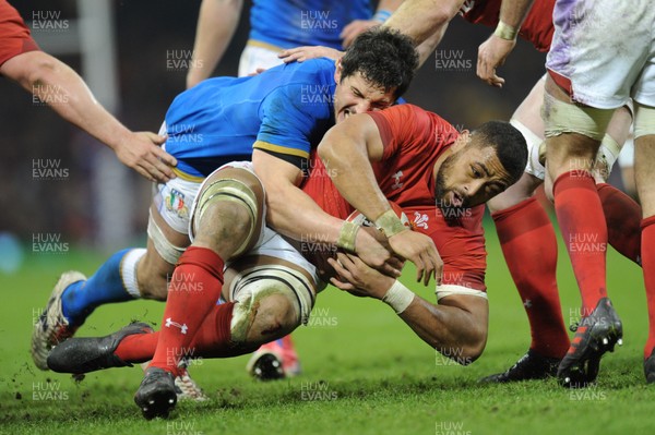 110318 - Wales v Italy - NatWest 6 Nations Championship - Taulupe Faletau of Wales is tackled by Alessandro Zanni of Italy 