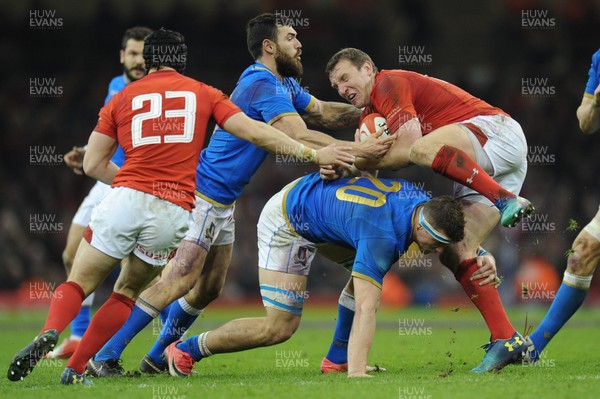 110318 - Wales v Italy - NatWest 6 Nations Championship - Hadleigh Parkes of Wales is upended by Giovanni Licata of Italy 