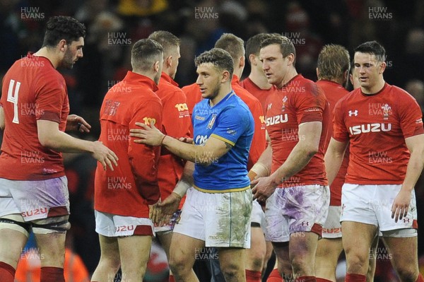110318 - Wales v Italy - NatWest 6 Nations Championship - Matteo Minozzi of Italy shakes hands with Wales players at the final whistle