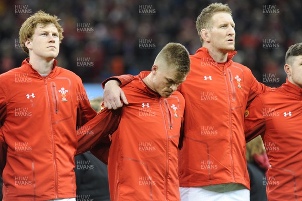 110318 - Wales v Italy - NatWest 6 Nations Championship - Rhys Patchell, Gareth Anscombe and Bradley Davies of Wales 