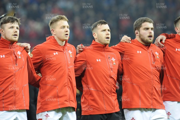 110318 - Wales v Italy - NatWest 6 Nations Championship - Steff Evans, James Davies, Gareth Davies and Nicky Smith during the anthem
