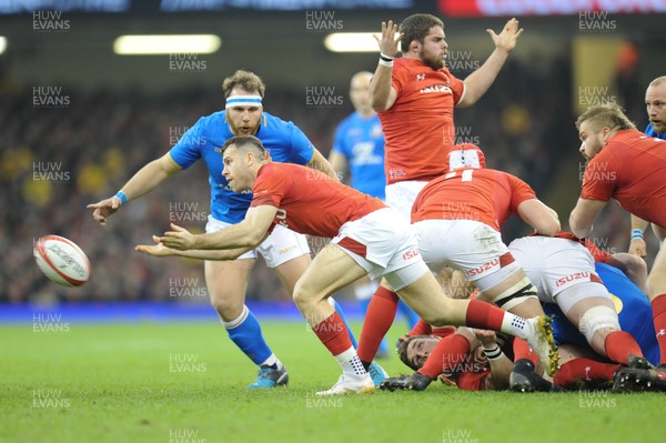110318 - Wales v Italy - NatWest 6 Nations Championship - Gareth Davies of Wales gets the ball away