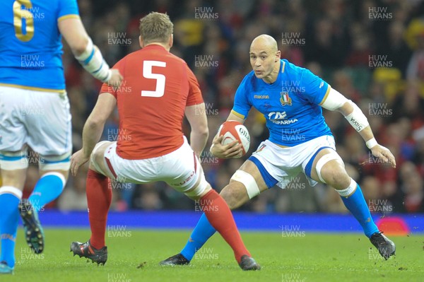 110318 - Wales v Italy - NatWest 6 Nations Championship - Sergio Parisse of Italy takes on Bradley Davies of Wales 