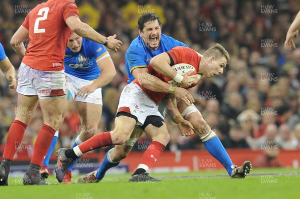 110318 - Wales v Italy - NatWest 6 Nations Championship - Liam Williams of Wales is tackled by Alessandro Zanni of Italy 