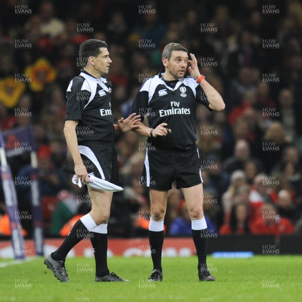110318 - Wales v Italy - NatWest 6 Nations Championship - Referee Jerome Garces watches the video replay 
