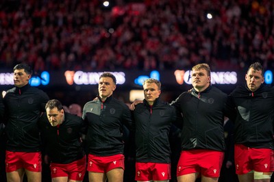 140326 - Wales v Italy - Guinness Six Nations - Wales players line up for the anthems 