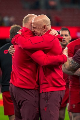 140326 - Wales v Italy - Guinness Six Nations - Neil Jenkins embraces  Head coach Steve Tandy after the game 