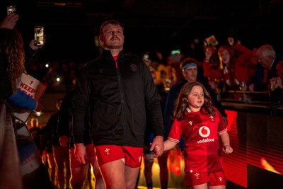 140326 - Wales v Italy - Guinness Six Nations - Dewi Lake of Wales leads the team out of the tunnel 