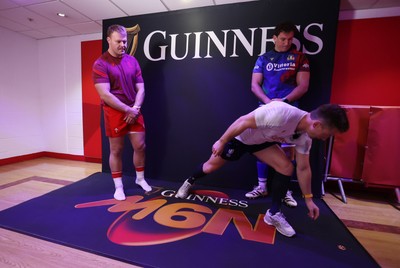 140326 - Wales v Italy - Guinness Six Nations Championship - Referee Christophe Ridley with captains Dewi Lake of Wales and Michele Lamaro of Italy during the coin toss