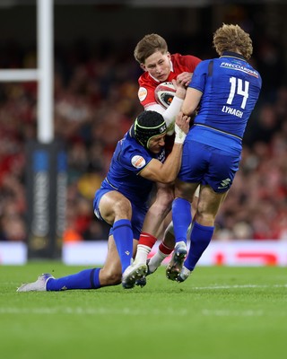 140326 - Wales v Italy - Guinness Six Nations Championship - Ellis Mee of Wales is tackled by Juan Ignacio Brex and Louis Lynagh of Italy 