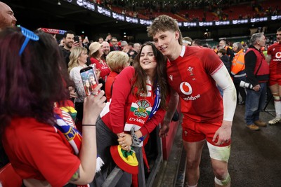 140326 - Wales v Italy - Guinness Six Nations Championship - Ellis Mee of Wales with fans