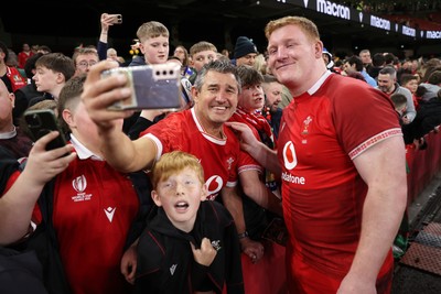 140326 - Wales v Italy - Guinness Six Nations Championship - Rhys Carre of Wales with fans