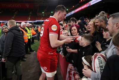 140326 - Wales v Italy - Guinness Six Nations Championship - Adam Beard of Wales with fans