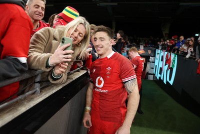 140326 - Wales v Italy - Guinness Six Nations Championship - Josh Adams of Wales with fans