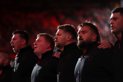140326 - Wales v Italy - Guinness Six Nations Championship - Olly Cracknell of Wales sings the anthem