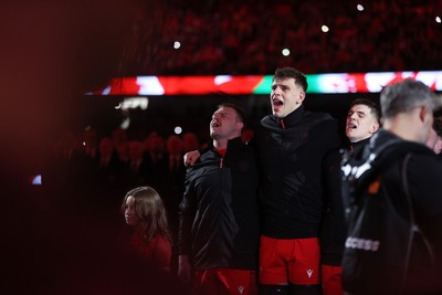 140326 - Wales v Italy - Guinness Six Nations Championship - Dewi Lake and Dafydd Jenkins of Wales sing the anthem