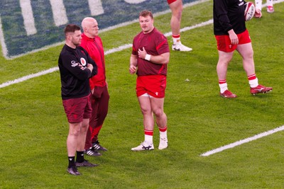 140326 - Wales v Italy - Guinness Six Nations - Dewi Lake of Wales talks to Wales head coach Steve Tandy during the warm up
