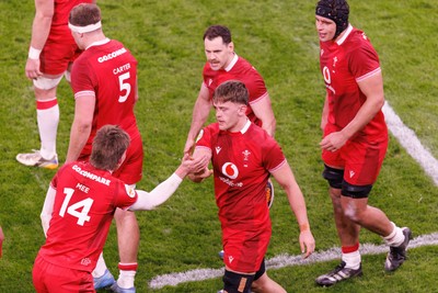 140326 - Wales v Italy - Guinness Six Nations - Alex Mann of Wales is congratulated by Ellis Mee