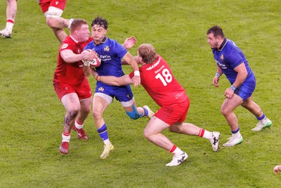140326 - Wales v Italy - Guinness Six Nations - Lorenzo Pani of Italy is tackled by Rhys Carre and Archie Griffin of Wales